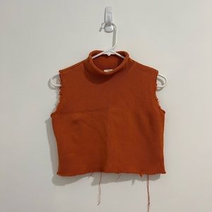 Mock neck sleeveless knit top